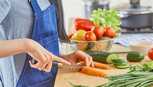 Women Chopping Vegetables